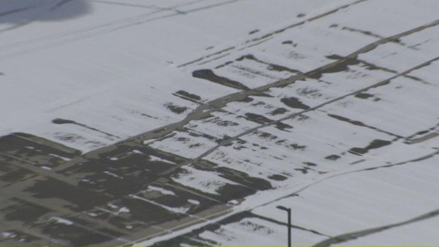 Sky 5 flies over snowy roads in the Triangle