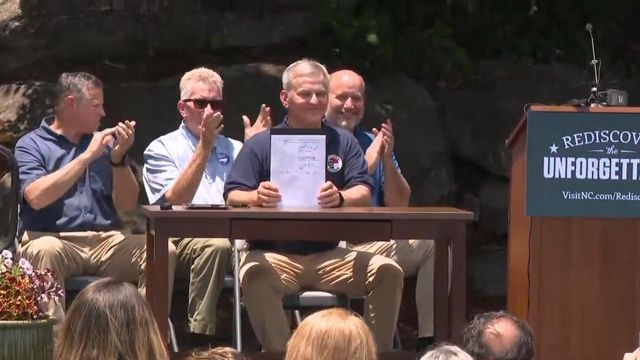Gov. Stein announces reopening of Chimney Rock State Park, signs recovery bill into law