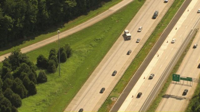 Sky 5 flies over car crash on US 1 near Walnut Street in Cary