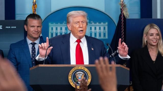 President Donald Trump speaks with reporters in the James Brady Press Briefing Room at the White House, Monday, Aug. 11, 2025, in Washington, as Secretary of Defense Pete Hegseth and Attorney General Pam Bondi look on. (AP Photo/Alex Brandon)