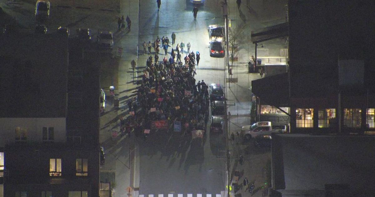 Fireworks in street, protester march in downtown Durham against ICE