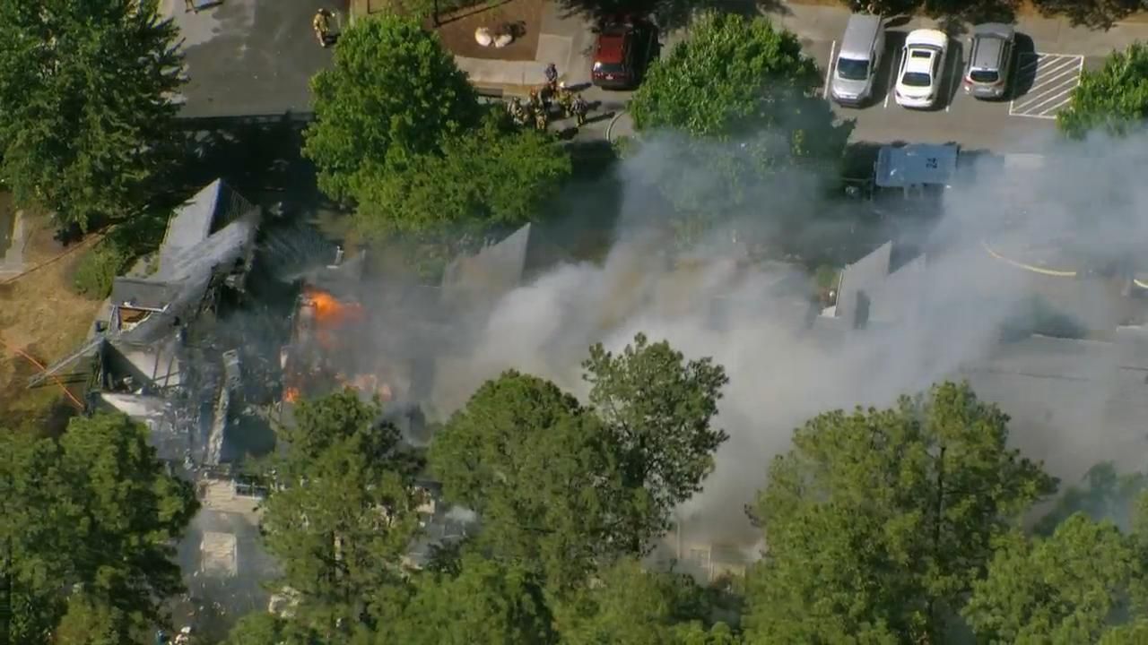 4 townhomes damaged , cat rescued after fire rips through Raleigh complex