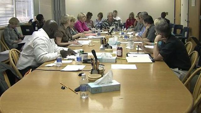 Wake school board talks job cuts