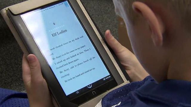 Raleigh school first in county to use eReaders