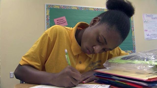 School raises achievement expectations of low-income students