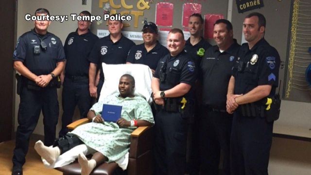 Police deliver diploma to injured grad