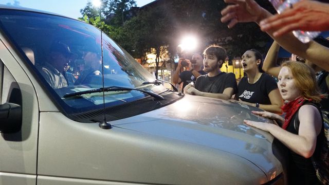 Protesters block, hit patrol car at UNC-CH rally