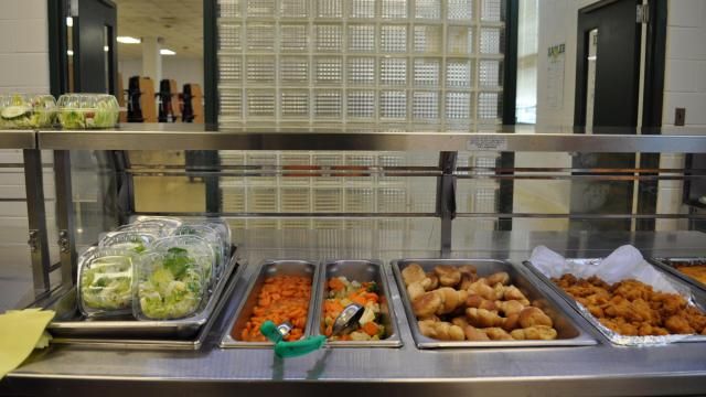 Lunch items await students in a buffet line at Neal Middle School in Durham (Julia Donheiser/WRAL contributor).