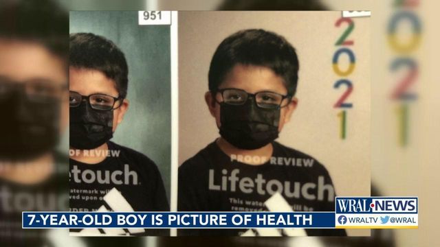 7-year old masks up for yearbook photo