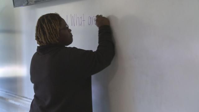 Ny'Asia Dickens-Jones at the whiteboard at West Edgecombe Middle School