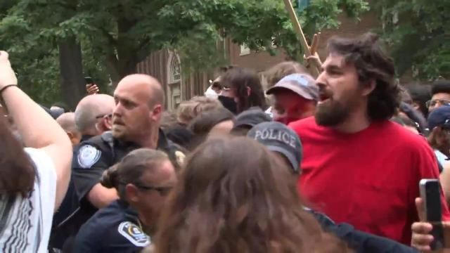 Protesters and police clash