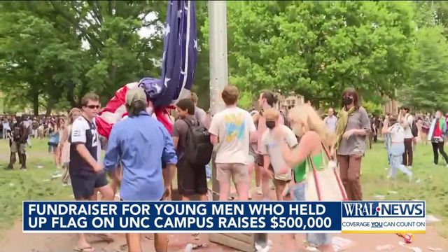 Fundraiser for young men who held up flag on UNC campus raises $500,000