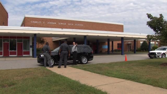A file photo of school resource officers at Charles E. Jordan Senior High School.