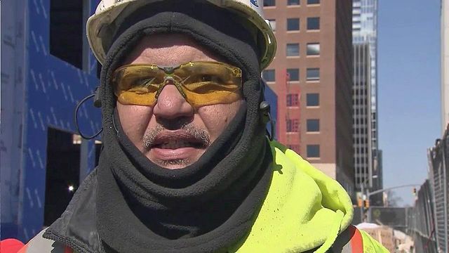 Workers brave bitter cold