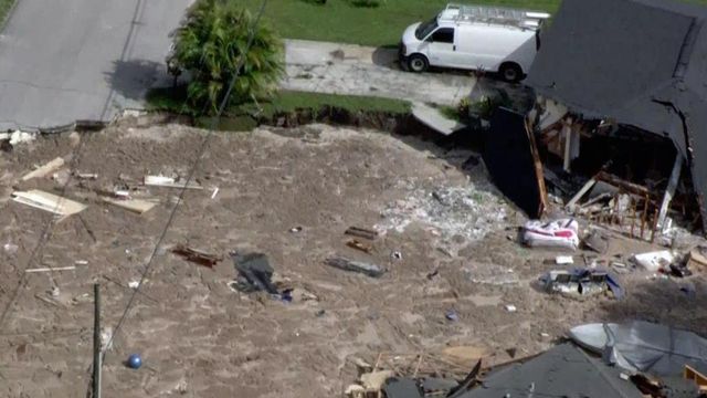 Aerials: Sinkhole swallows Florida home