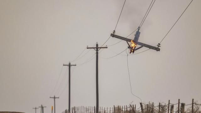 A telephone pole burns from the Smokehouse Creek Fire, Wednesday, Feb. 28, 2024, in Canadian, Texas. (AP Photo/David Erickson) A telephone pole burns from the Smokehouse Creek Fire, Wednesday, Feb. 28, 2024, in Canadian, Texas. (AP Photo/David Erickson)