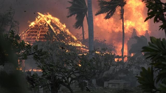 The hall of historic Waiola Church in Lahaina and nearby Lahaina Hongwanji Mission are engulfed in flames along Wainee Street on Aug. 8, 2023, in Lahaina, Hawaii. Hawaii’s attorney general on Monday, March 18, 2024 blamed a delay of the release of a key report into a deadly Maui wildfire on county agencies that forced investigators to issue subpoenas. (Matthew Thayer/The Maui News via AP, file) The hall of historic Waiola Church in Lahaina and nearby Lahaina Hongwanji Mission are engulfed in flames along Wainee Street on Aug. 8, 2023, in Lahaina, Hawaii. Hawaii’s attorney general on Monday, March 18, 2024 blamed a delay of the release of a key report into a deadly Maui wildfire on county agencies that forced investigators to issue subpoenas. (Matthew Thayer/The Maui News via AP, file)