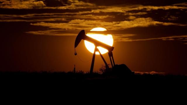 FILE - The sun sets behind an idle pump jack near Karnes City, Texas, April 8, 2020. The U.S. Securities and Exchange Commission paused on Thursday, April 4, 2024, the implementation of its new climate disclosure rule while it defends the regulation in court. (AP Photo/Eric Gay, File) FILE - The sun sets behind an idle pump jack near Karnes City, Texas, April 8, 2020. The U.S. Securities and Exchange Commission paused on Thursday, April 4, 2024, the implementation of its new climate disclosure rule while it defends the regulation in court. (AP Photo/Eric Gay, File)