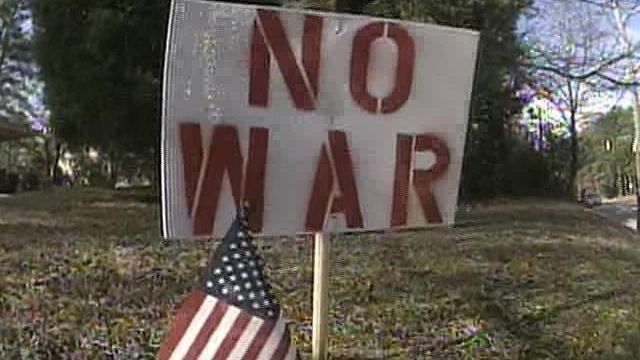 Army Wife's Anti-War Signs Draw Fire