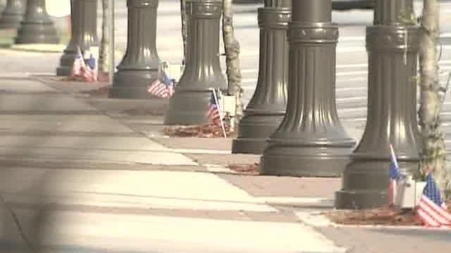 Benson Stakes Out National Colors for Soldier's Funeral