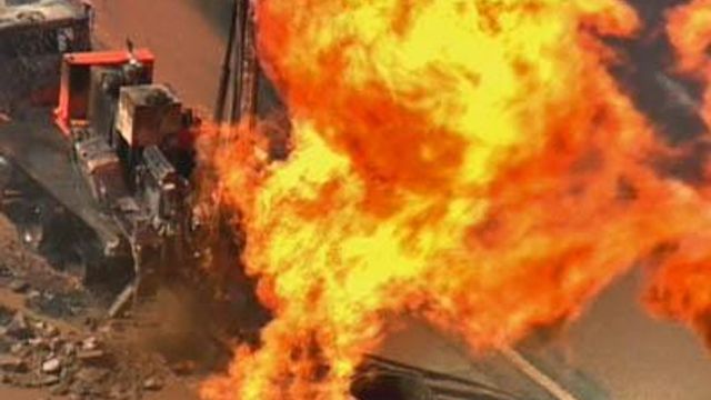 Ruptured Gas Line Erupts in Flames