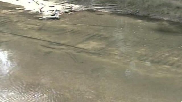 Drought Exposes Rare Boat in Tar River 