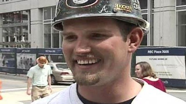 Ironworker stands tall to top off Raleigh skyline