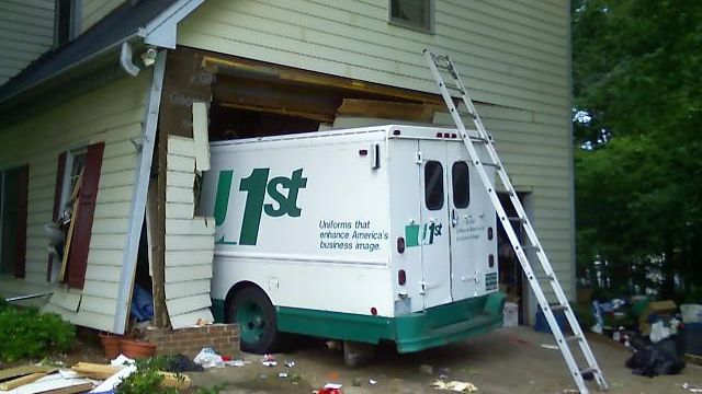Truck crashes into house but neighbors not surprised