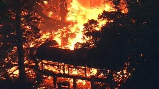 Web Only: Crews fight large fire near Cary