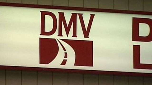 DMV official settles wrongful termination suit