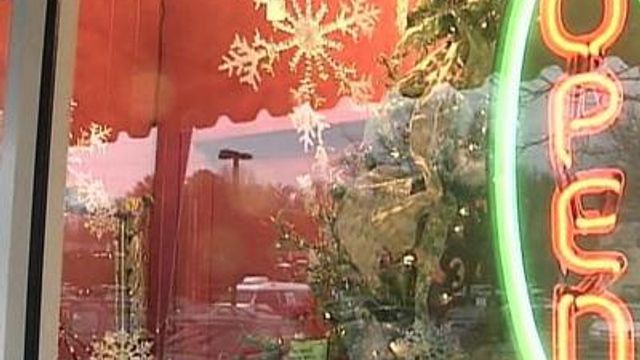 Shoppers rein in holiday spending