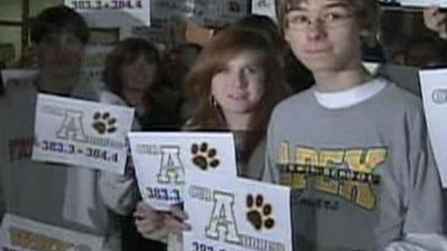 Apex parents, students protest before reassignment meeting
