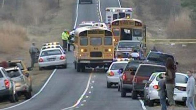 Dad charged in Wake school bus shooting
