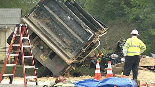 Paramedic rescues woman pinned by dump truck