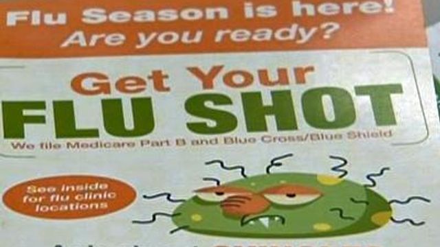 People get flu shots at drug stores