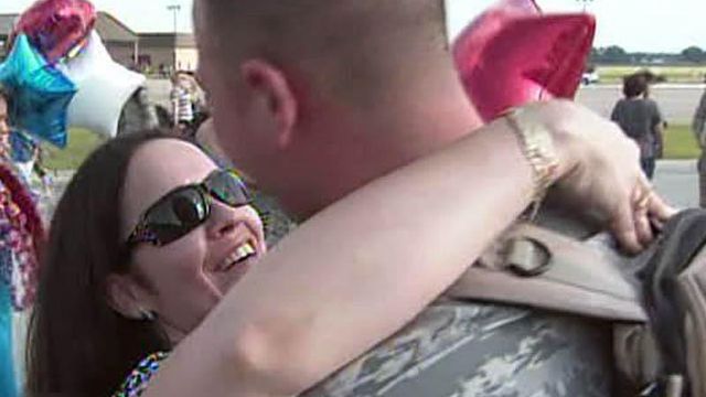 Crowds welcome airmen back from Afghanistan
