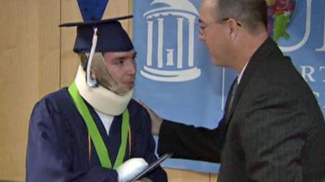 Burn victim gets diploma while still a patient