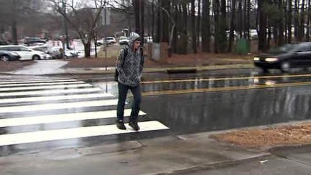 Driver charged after student hit in crosswalk