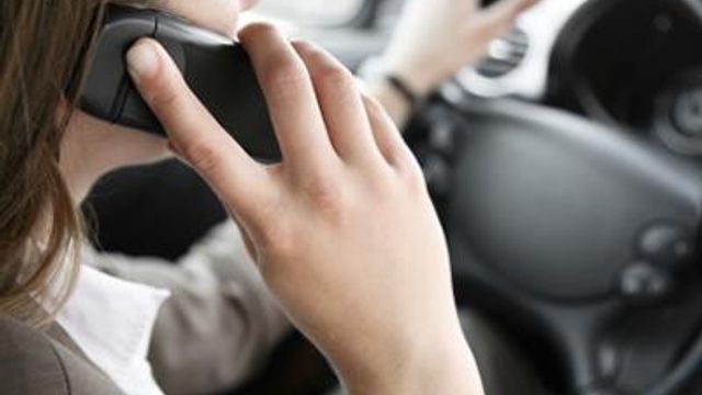 Ban cell phones while driving?