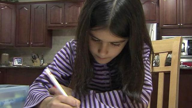 Cary girl using art to help local families