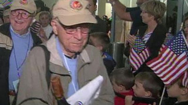 Local veterans return from Triangle Flight of Honor