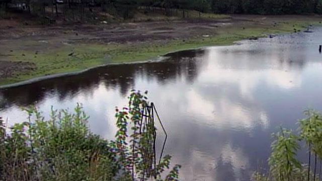 Cameron residents consider rebuilding ruptured dam after scare