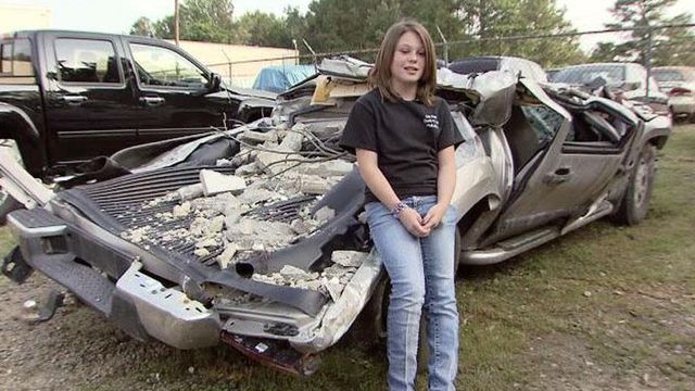 Lee County girl escapes tornado-squashed truck to save father