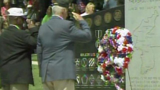 Field of flags honors war dead in Fayetteville