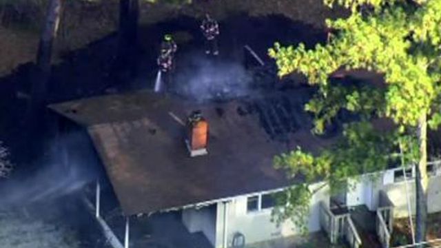 Dispatcher discovers house on fire during 911 call