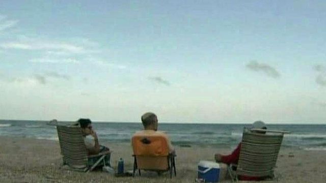 Beachgoers enjoy calm before Beryl at NC coast