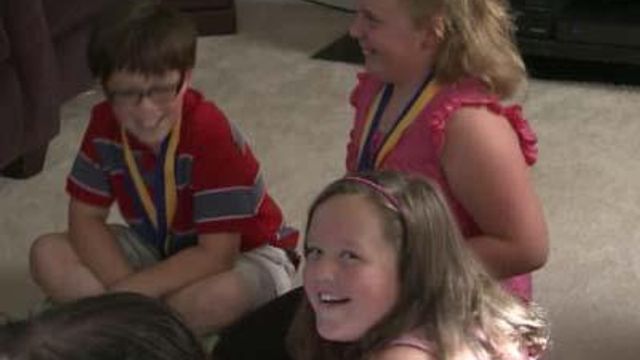 Garner children receive medals for quick thinking