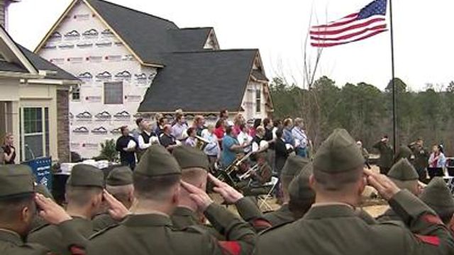 Disabled veteran receives new home for the holidays