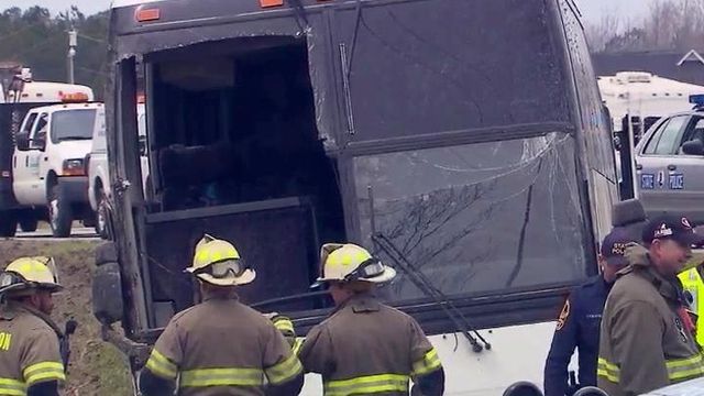 Charter bus from Chapel Hill flips, killing one