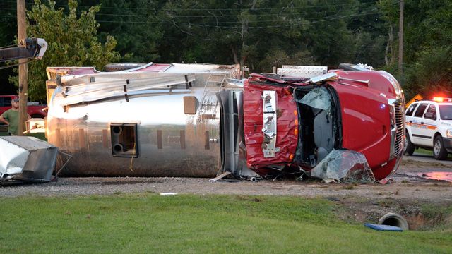 One killed, another injured in fire truck wreck